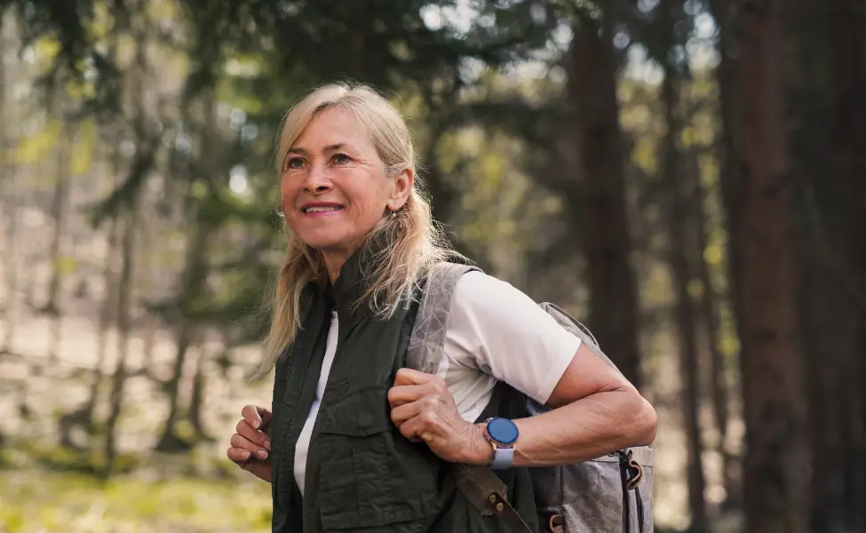 woman walking countryside backpack