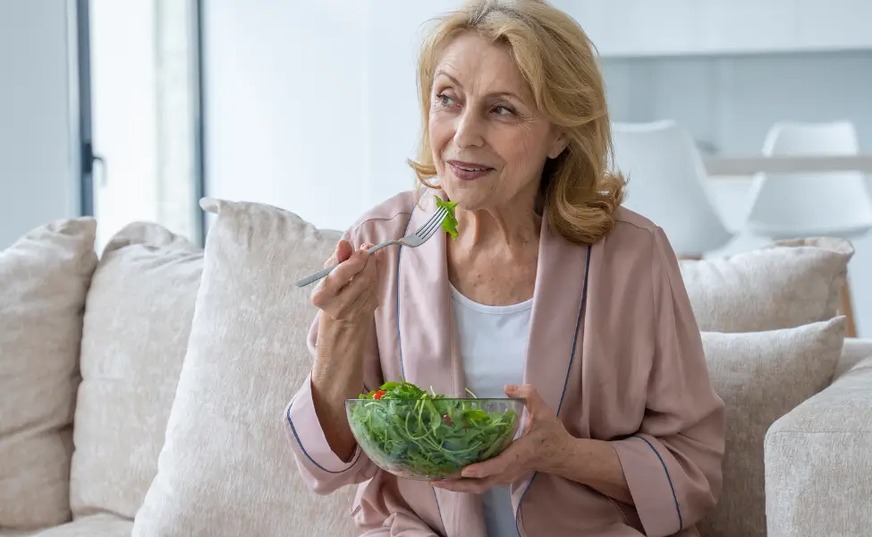 eating alone on the couch