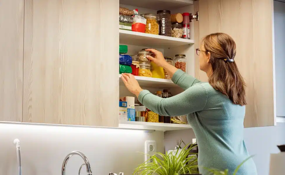 a cupboard of tins and dry staples