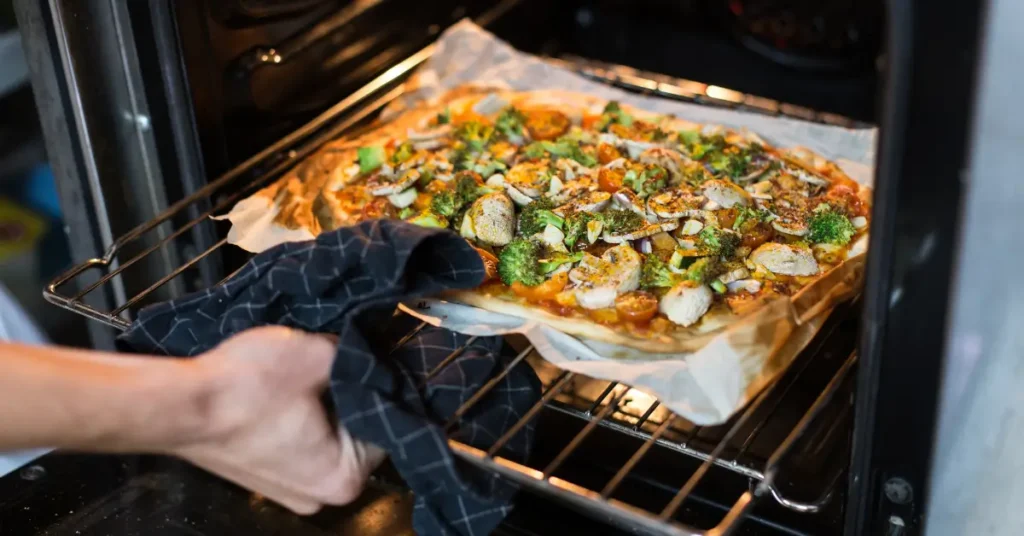one tray of fish and vegetables from the oven