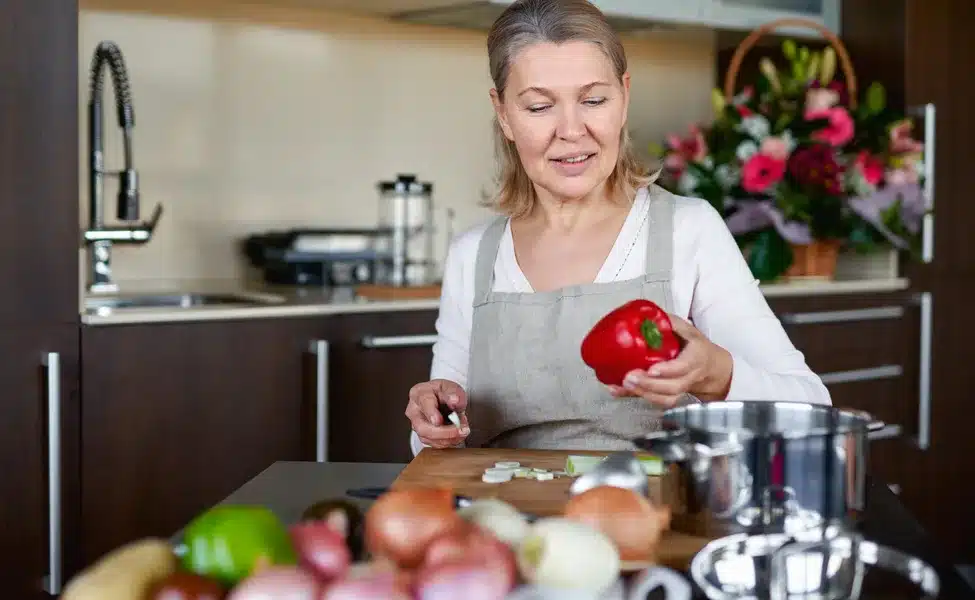 woman-preparing-vegetables-kitchen